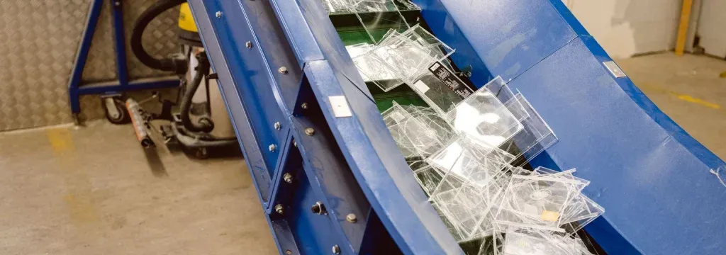 Hone destructive services. Image of CD waste being ethically broken down and disposed.