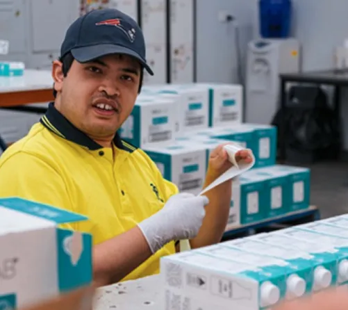 Supported employee filling 3PL order with order form