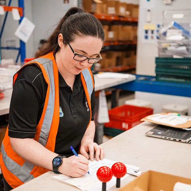 Hone supported employee in warehouse fulfilling orders