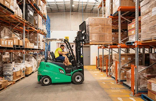 Hone supported employee in warehouse on forklift