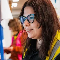 Staff member smiling at work