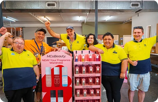 Hone supported employees standing around display